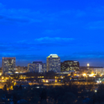 picture of commercial real estate in colorado springs with downtown lights and night sky
